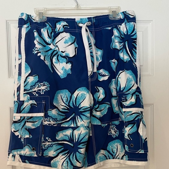 WONDERWALL MENS BOARD SHORTS IN BLUE HAWAIIAN FLORAL - Picture 1 of 4